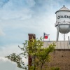 a water tower on top of a building